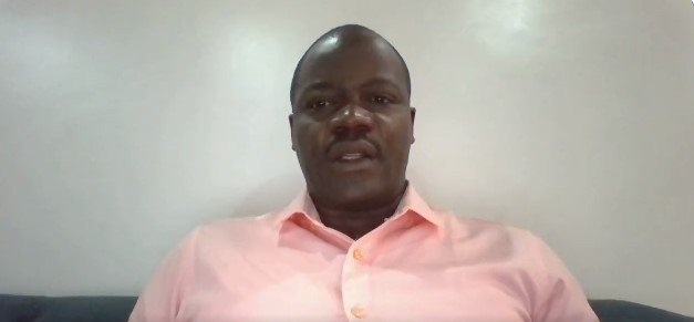 Ladislas Nshimiyimana talks to camera